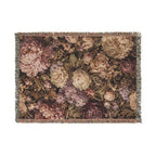 A rectangular woven textile with a dense floral pattern in muted pink, beige, brown, and mauve tones, finished with fringed edges on all sides, shown on a plain white background.