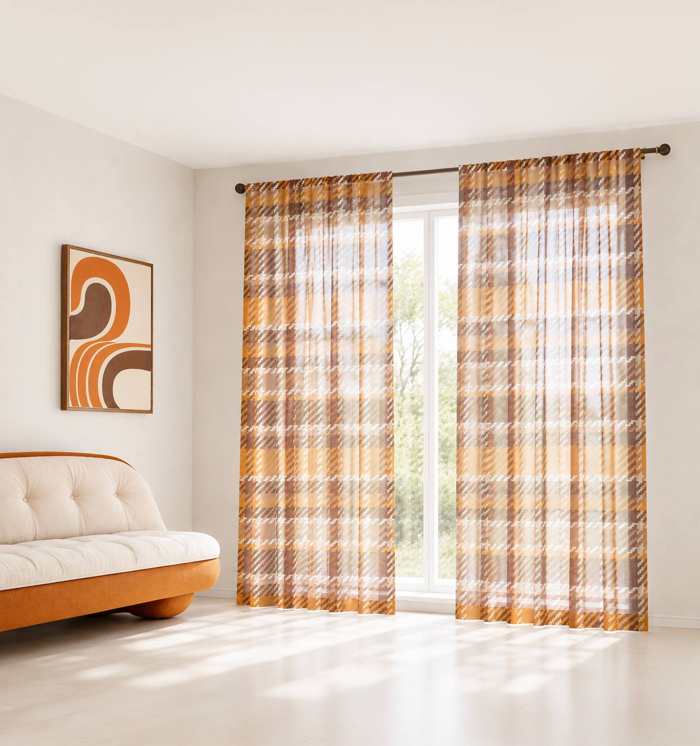 A pair of sheer curtain panels with a brown and beige plaid pattern hanging on a dark rod in a bright, modern living room with a white sofa and abstract wall art.