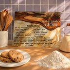 A personalized wooden recipe board for 'Nana Linda's Kitchen' displaying the recipe for vanilla molasses cookies, styled on a wooden countertop with baking ingredients and utensils.