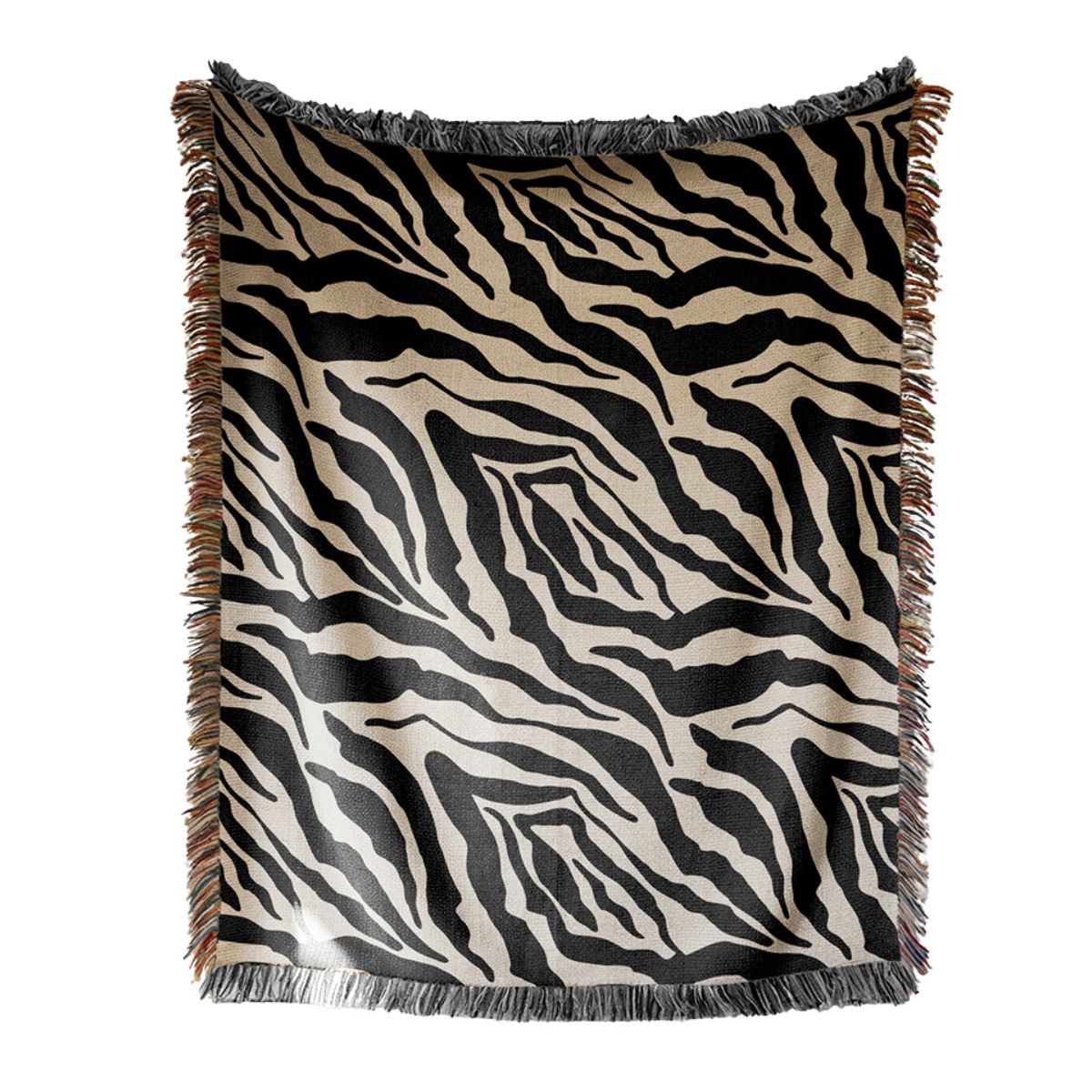 Zebra patterned throw blanket with fringes on a white background