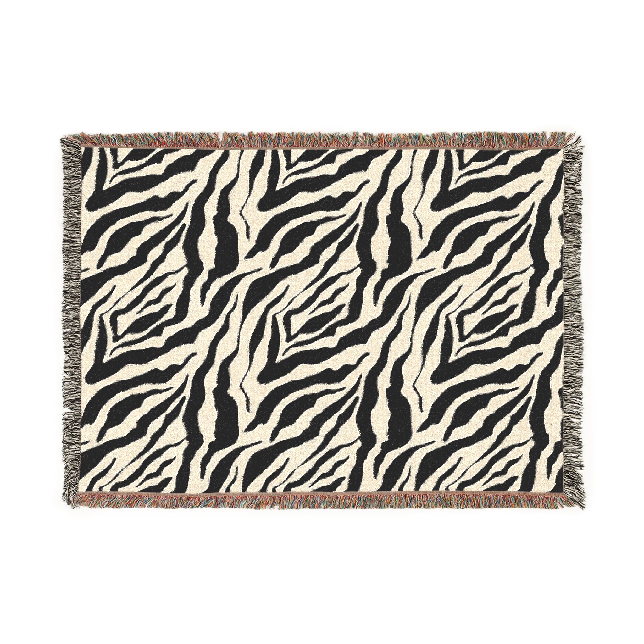 Zebra patterned throw blanket on a white background