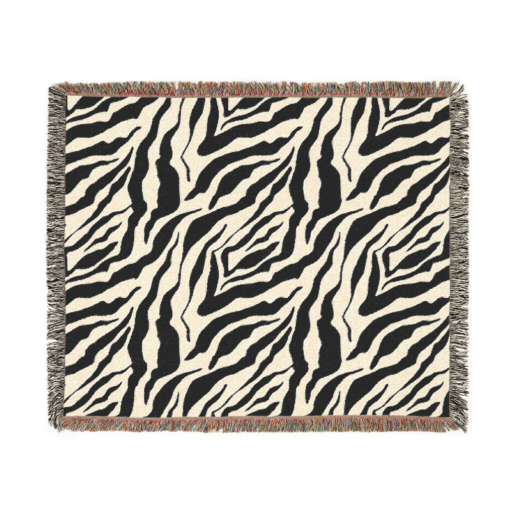 Zebra patterned throw blanket on a white background